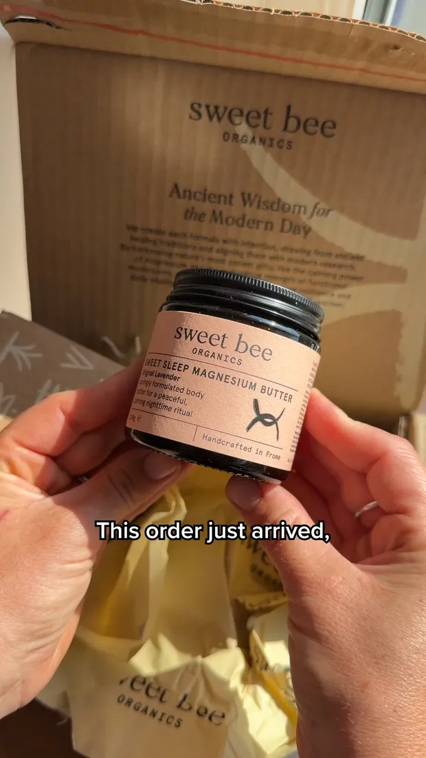 Sweet Bee saved frame with hands holding a jar above an opened branded parcel