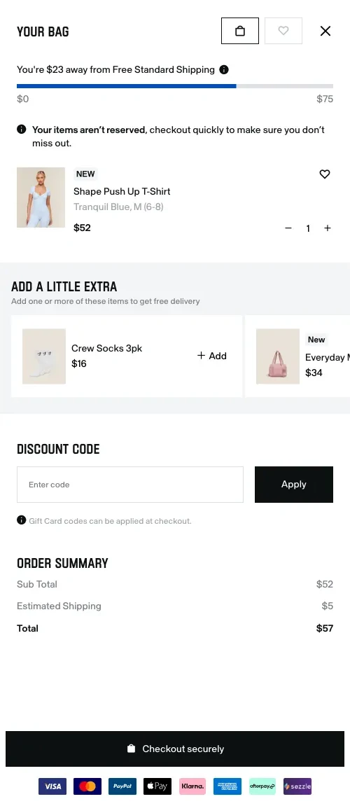 Gymshark populated desktop cart drawer with item details and checkout summary